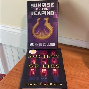 Set of two books: Sunrise of the Reaping by and Society of Lies
